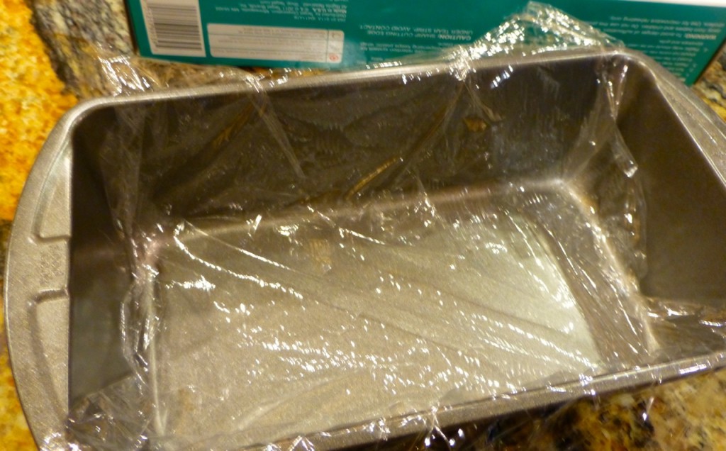 Line a pan with plastic wrap