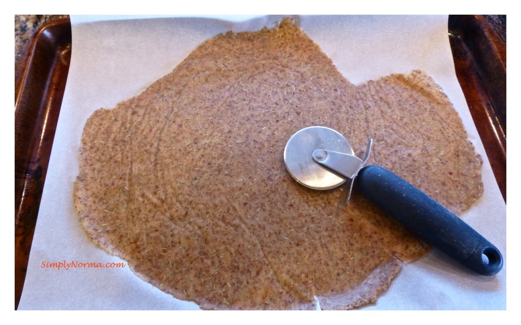 Transfer flattened dough to cookie sheet