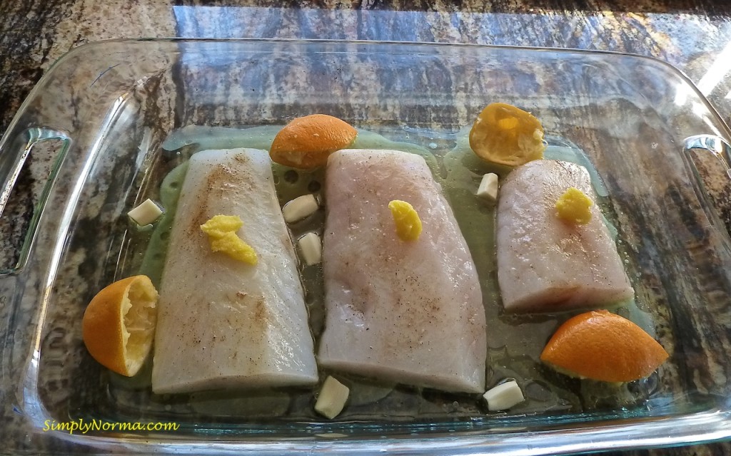 Add cod and lemon to the baking dish