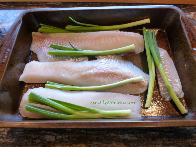 Add scallions to the cod