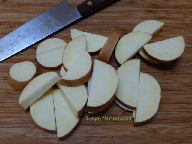 Slice sweet potatoes into quarters