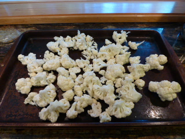 Spread cauliflower out on a cookie sheet