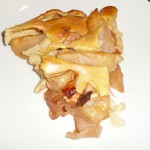 Slice of baked apple pancake